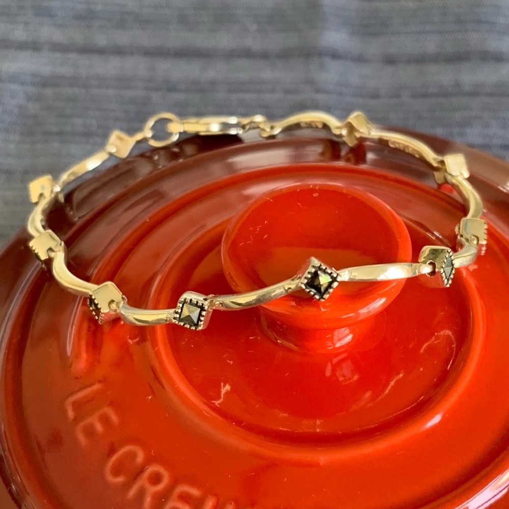QVC sterling silver 7 1/2 inch delicate marcasite station bracelet.